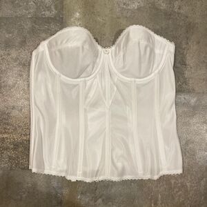 white boned corset with lace trim and center flower with a tiny crystal 36c